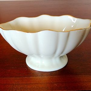 Lenox bowl 3.5" L Off white w gold trim.